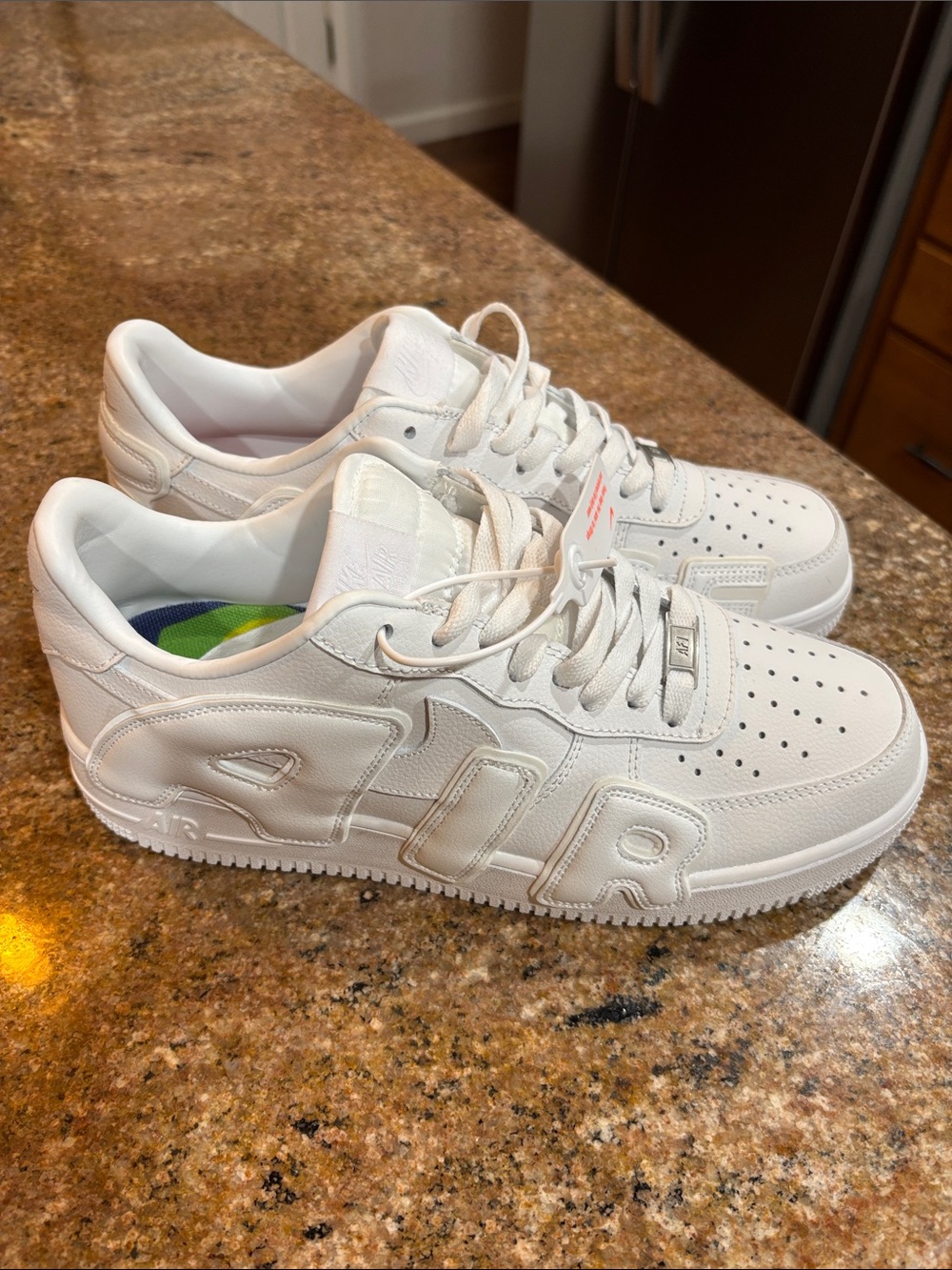All-White Embossed Low-Top Sneakers